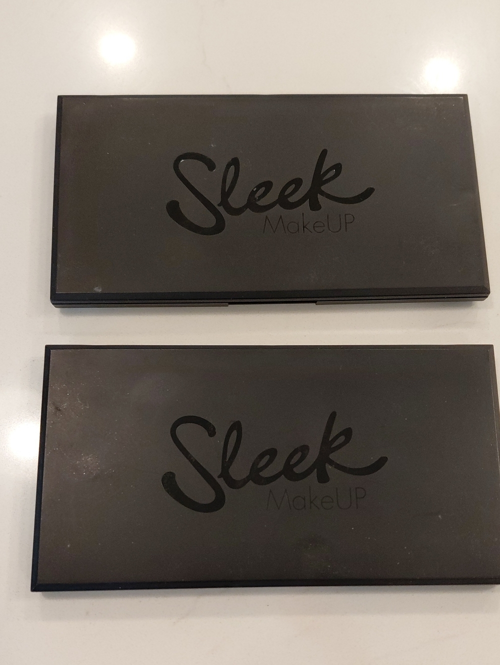 Two Sleek Makeup Eyeshadow Palettes— Classic Black Finish With Perfect Colors.